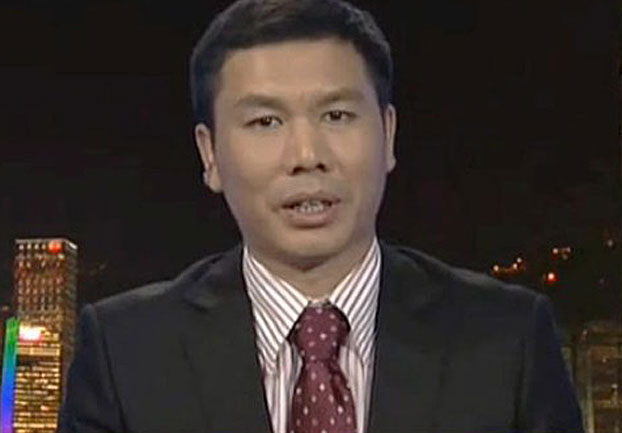 Former Commercial Daily editor Long Zhenyang is shown in an undated photo.