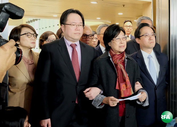Selina Tsang talks to reporters after her husband, former Hong Kong Chief Executive Donald Tsang, received a 20-month jail term for breach of public trust, Feb. 22, 2017. 