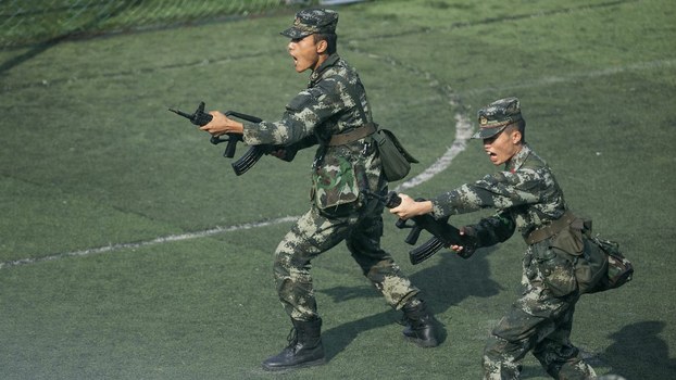 Chinese paramilitary policemen train outside the Shenzhen Bay Sports Center in Shenzhen, near China's border with Hong Kong, Nov. 1, 2019. 
