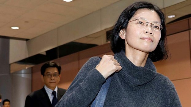 Lee Ching-yu, whose Taiwanese rights activist and NGO worker husband Lee Ming-cheh is currently serving a prison sentence in China for "subversion," travels to China to visit her husband and inform him of his father's death, in an undated photo.

