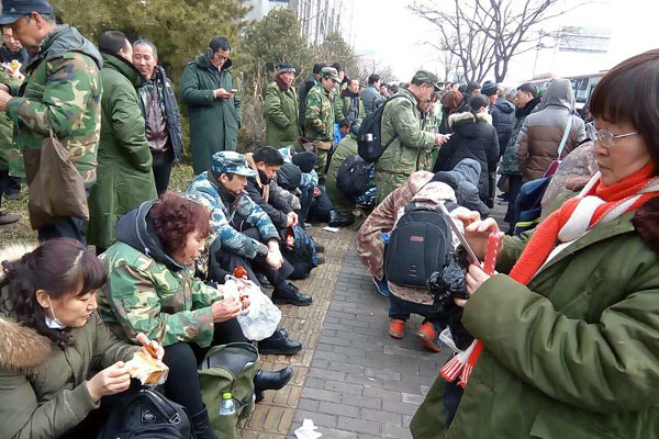 Disgruntled veterans of China's People's Liberation Army (PLA) are shown in an earlier protest in Beijing, Feb. 22, 2017.