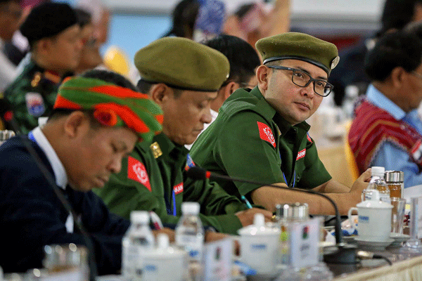 Arakan Army leaders attend the opening of a four-day summit to discuss a framework for the government’s upcoming peace conference in Mai Ja Yang, northern Myanmar's Kachin state, July 26, 2016.