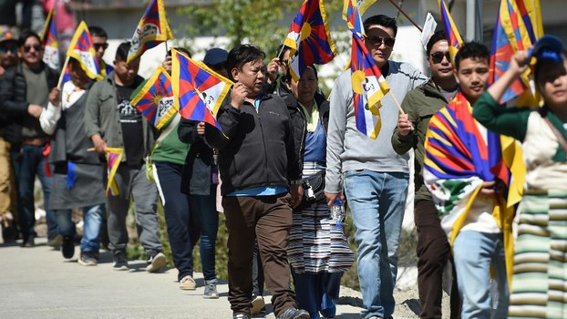 Tibetans living in exile in India march during the 60th anniversary of the Tibetan Uprising Day that commemorates the 1959 Tibetan uprising, in McLeod Ganj, March 10, 2019. 