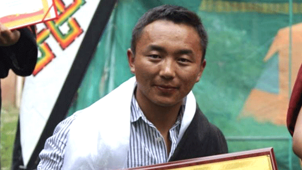 Pema Samdup is shown at his college graduation ceremony in Xining, Qinghai, May 2018.